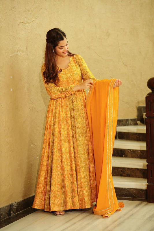 Beautiful and Stylish Full Flair Gown for Women In Yellow Color